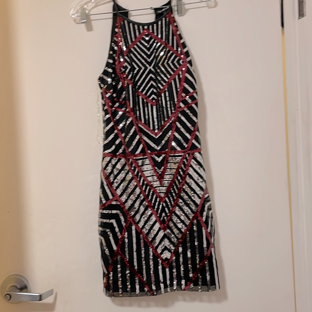 Beautiful sequence dress perfect for holiday celebrations!